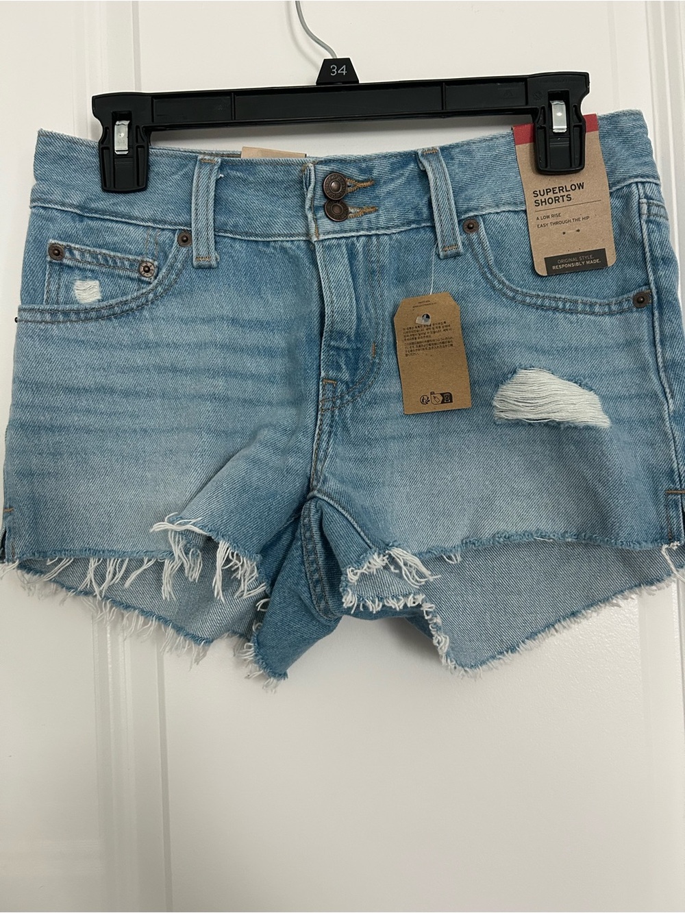 Levi's Light Blue Superlow Distressed Denim Shorts